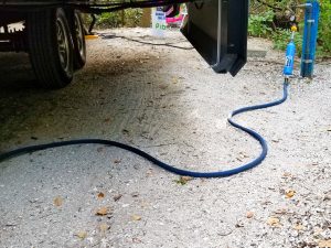hose routing for travel trailer setup