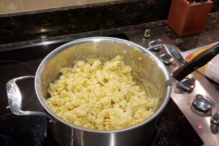 adding pasta